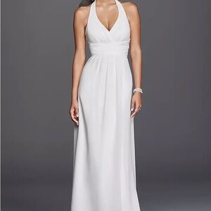 White maxi gown with halter neckline and backless design for brides